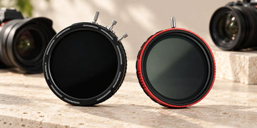 Black H&Y RevoRing Mark II and red Haida PROII filters beside camera lenses; generated illustration